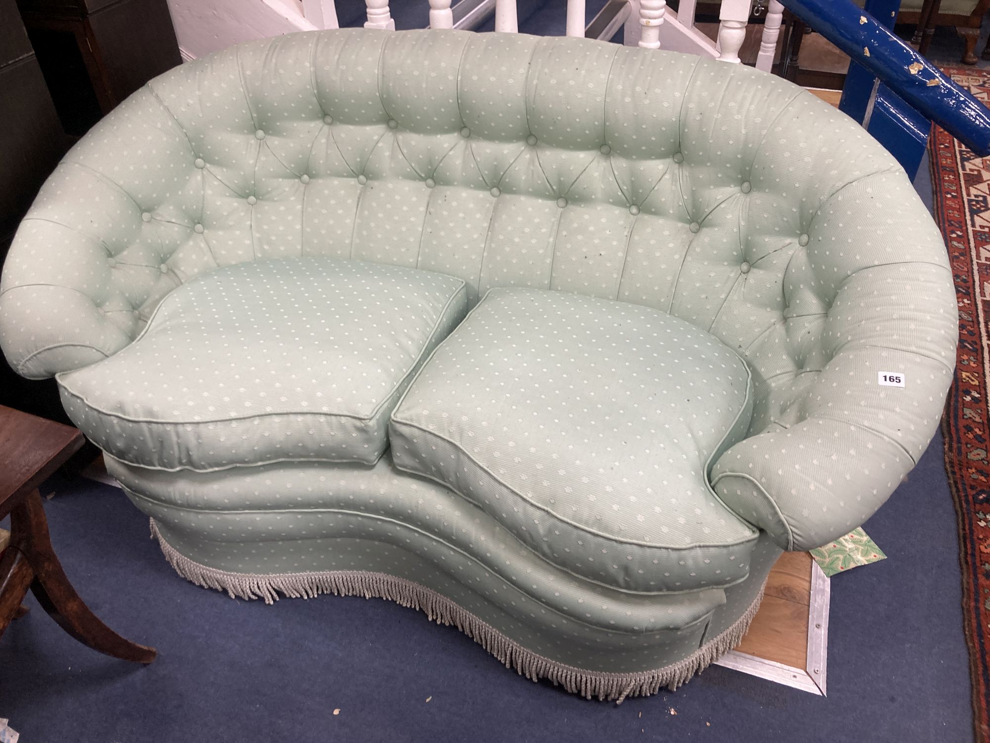 A tub framed two seater settee upholstered in patterned pale green fabric, length 150cm, depth 80cm, height 78cm